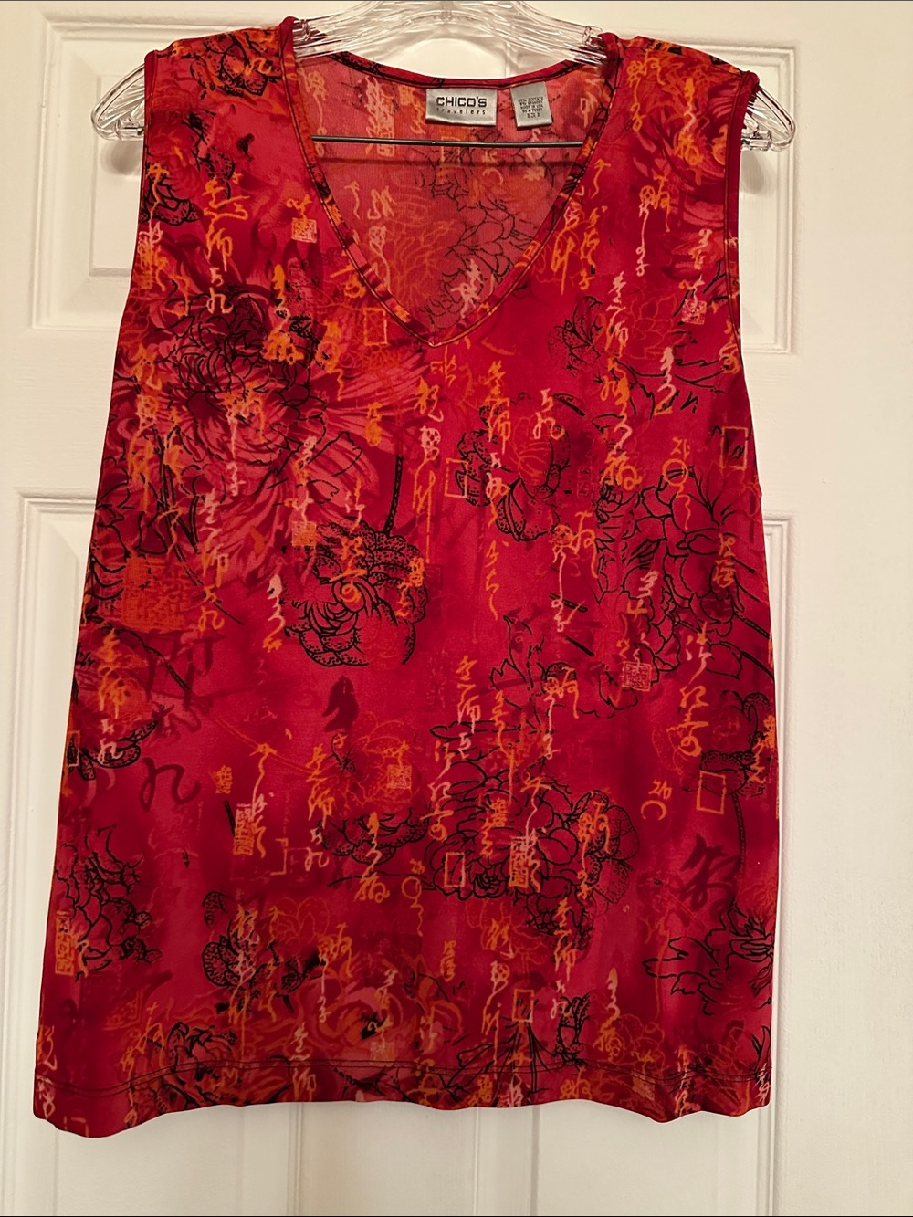Chico's Red Sleeveless V-Neck Top with Reddish Orange & Black Motif